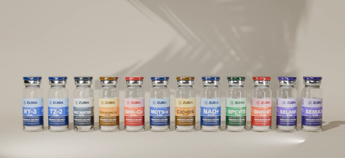 The six ZUMA vials in a row: blue, green, green, red-orange, amber and blue labels